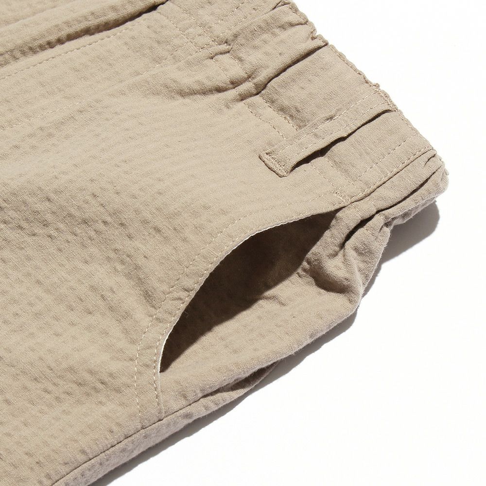 Sheer soccer shorts with applique pockets Beige Design point 1