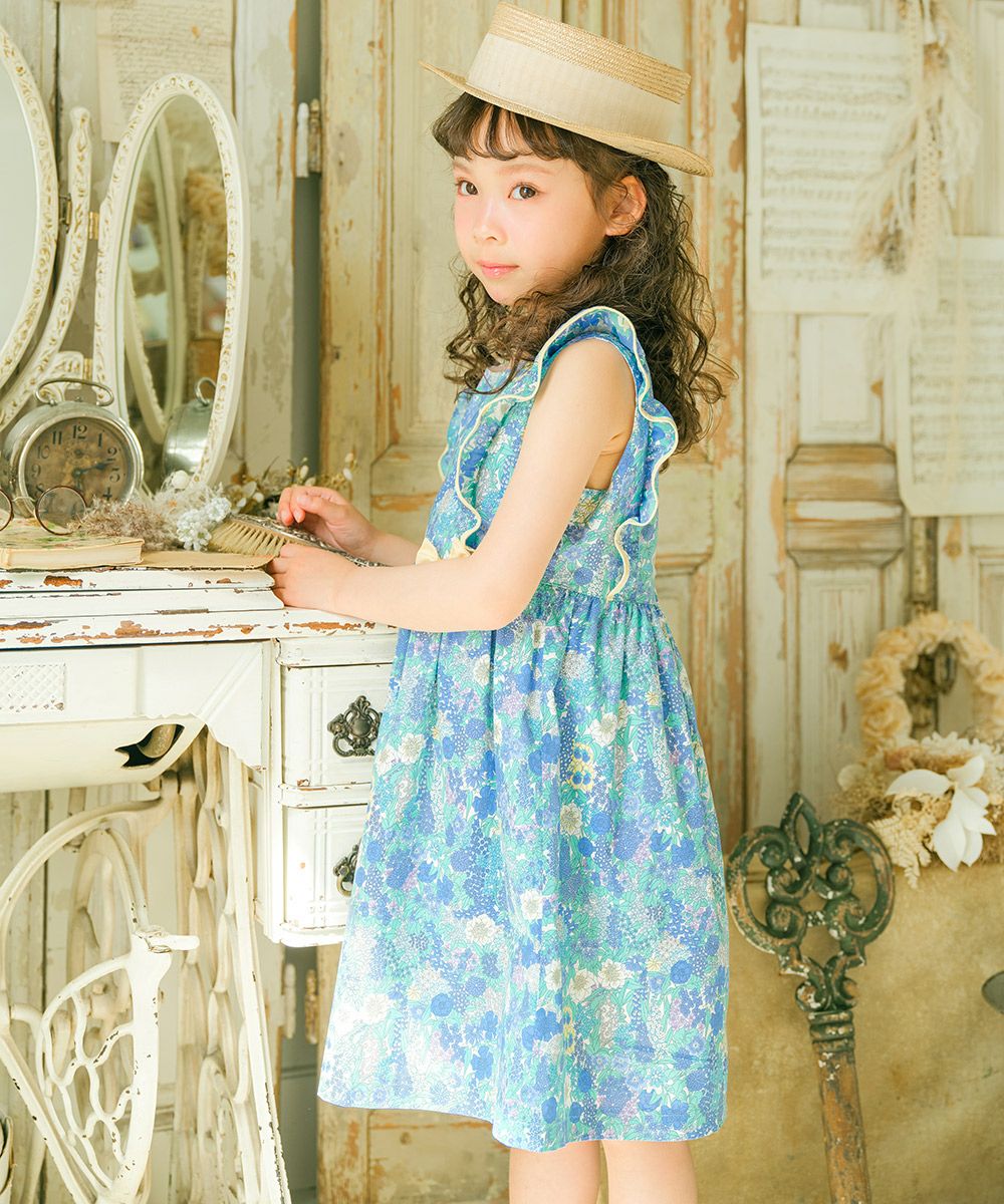 100 % Japanese cotton Liberty print used frill ribbon flower pattern dress Blue model image whole body